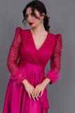 Long dress with sequined bodice and feathers, fuchsia color