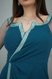 Maxi dress with tulle sleeves decorated with a turquoise crystal ribbon