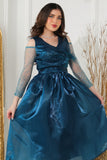 Fluffy evening dress decorated with turquoise beads