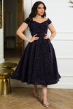 Mid-length evening dress decorated with navy blue sequins