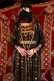 Jalabiya with a traditional design with a black bisht 