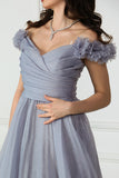 Gray evening dress with ruffle sleeves