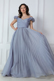 Gray evening dress with ruffle sleeves