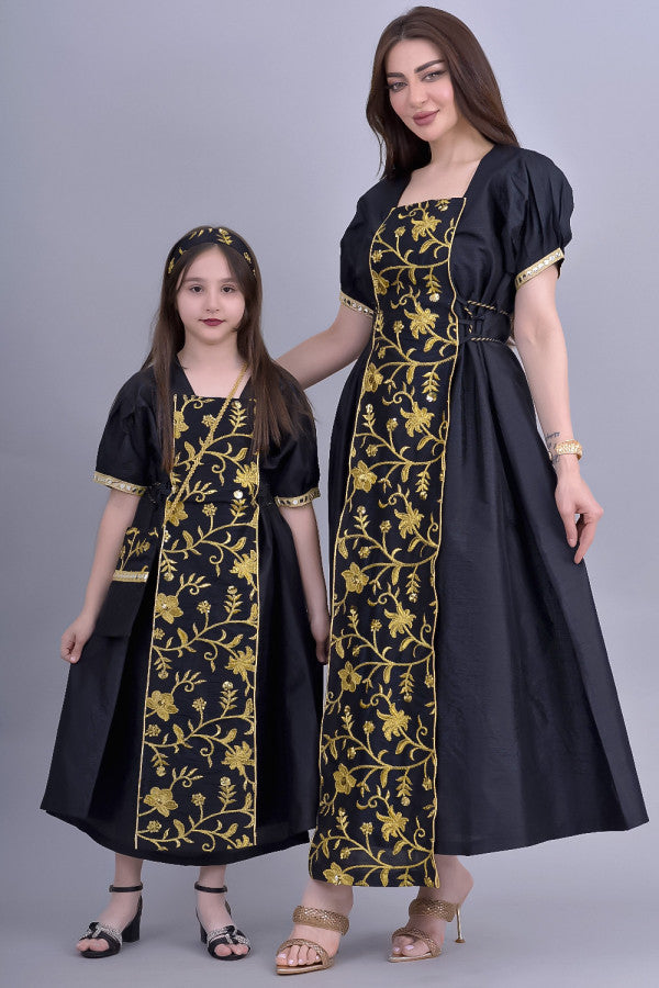 Girls' Shantoun robe with oriental design, embroidered in gold, black colour 