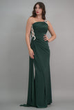 Green one-shoulder jersey evening dress embroidered with crystals