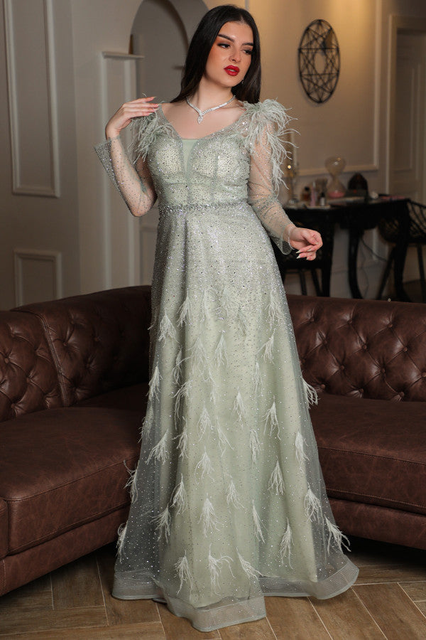 Light green feather-embellished off-shoulder evening dress