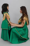 Kuwaiti girls' jalabiya with split detail and decorated with a green fringe