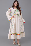 Linen robe embroidered and decorated with colorful tassels 