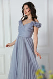 Gray evening dress with ruffle sleeves