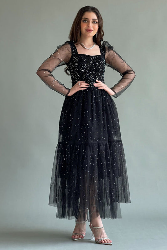 Black tulle evening dress decorated with beads