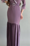 Pleated satin dress decorated with a crystal ribbon and mauve feathers