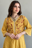 Jalabiya with cloche cut, embroidered in yellow