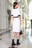 Short white knitted dress with buttons 