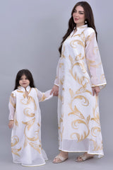 Girls' oriental galabiya, embroidered with a white and gold veil