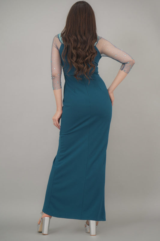 Maxi dress with tulle sleeves decorated with a turquoise crystal ribbon