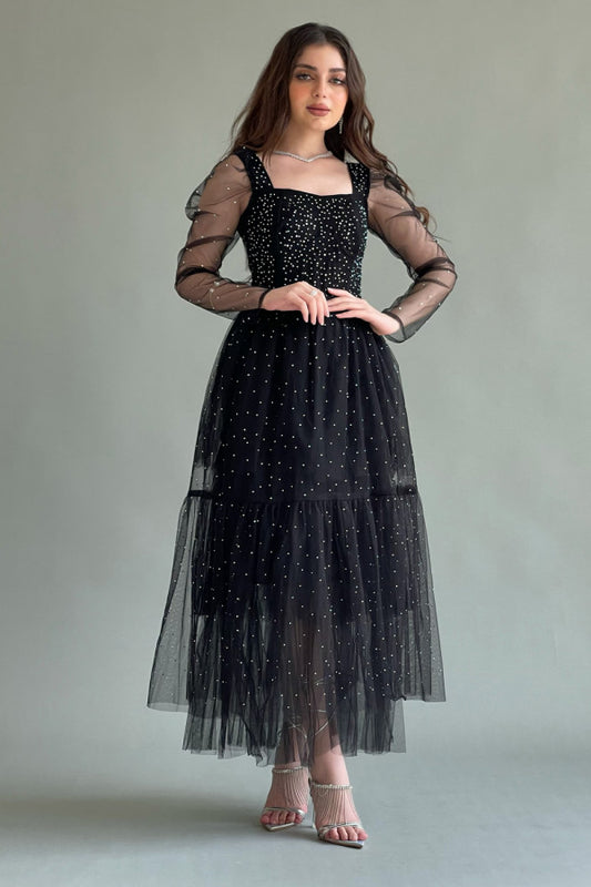 Black tulle evening dress decorated with beads