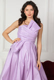 Short evening dress with a bow, lavender color