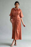 Pleated shirt dress decorated with crystals and orange feathers