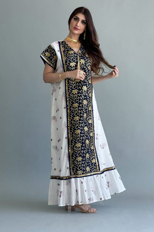 Embroidered galabiya decorated with navy blue tassels