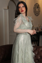 Light green feather-embellished off-shoulder evening dress