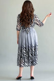 Gray chiffon dress with wavy patterns