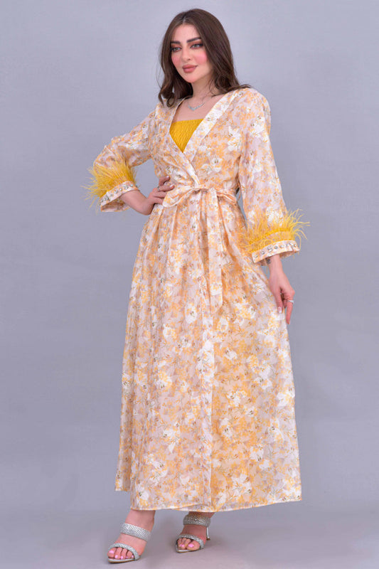 Two-piece dress with a floral coat, decorated with feathers and crystals, yellow
