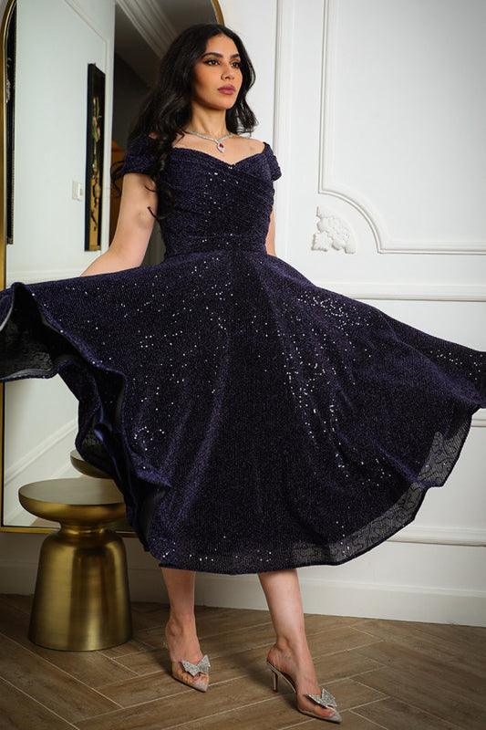 Mid-length evening dress decorated with navy blue sequins