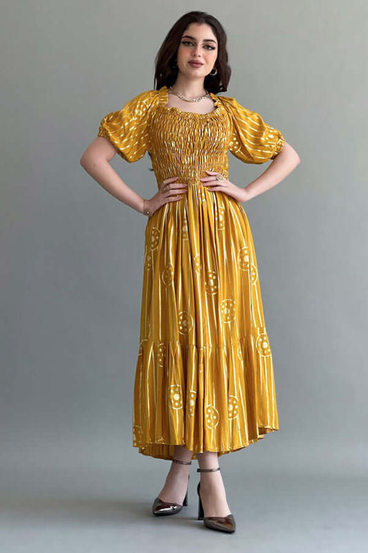 A modern galabiya with an embellished dress, cumin colour
