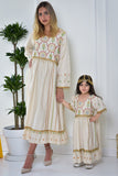 Girls' galabiya with embroidered lines and colorful patterns, decorated with beads and lullabies 