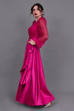 Long dress with sequined bodice and feathers, fuchsia color