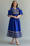 Shanton jalabiya embroidered with Islamic indigo patterns 