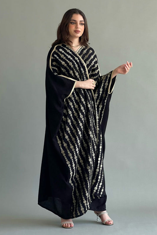 A two-piece plain galabiya with a bisht embroidered with gold threads, black colour