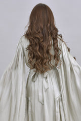 Metallic dress with pistachio cape sleeves