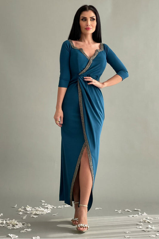 Wrap style jersey dress decorated with a crystal band, petrol colour