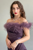 Satin dress decorated with mauve feathers