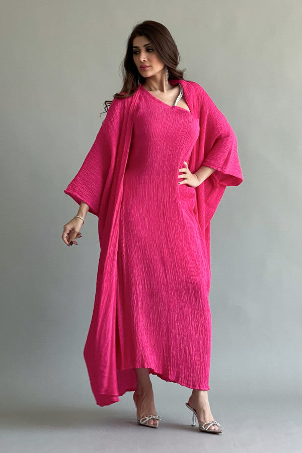 An elegant two-piece jalabiya with modern details, fuchsia color 