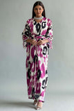 Split dress with a belt at the waist, embroidered with crystals, fuchsia color