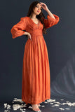 Orange pleated taffeta dress