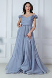 Gray evening dress with ruffle sleeves