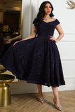 Mid-length evening dress decorated with navy blue sequins