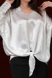 White jacquard blouse with drawstring 