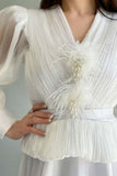 Cloche dress decorated with feathers and a lulu on the chest, white