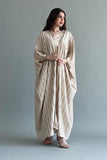 A plain two-piece galabiya with a bisht embroidered with golden threads, beige color