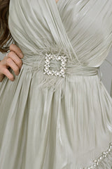 Metallic dress with pistachio cape sleeves