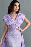 Evening dress embroidered with a mauve train design