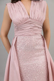 Evening dress embroidered with a pink train design