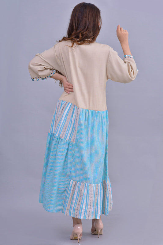 Jalabiya with pleats decorated with blue tassels