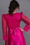 Long dress with sequined bodice and feathers, fuchsia color