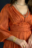 Orange pleated taffeta dress