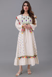 Linen robe embroidered and decorated with colorful tassels 